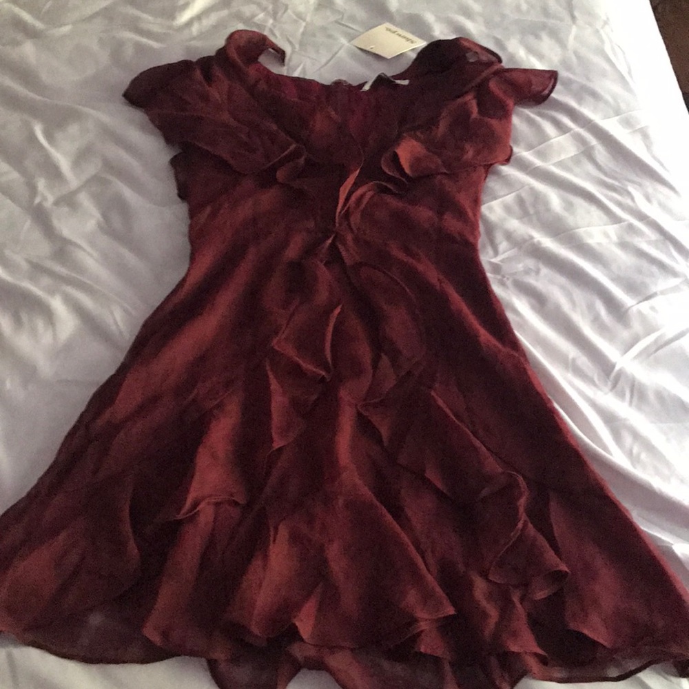 Magenta colored mini ruffle dress